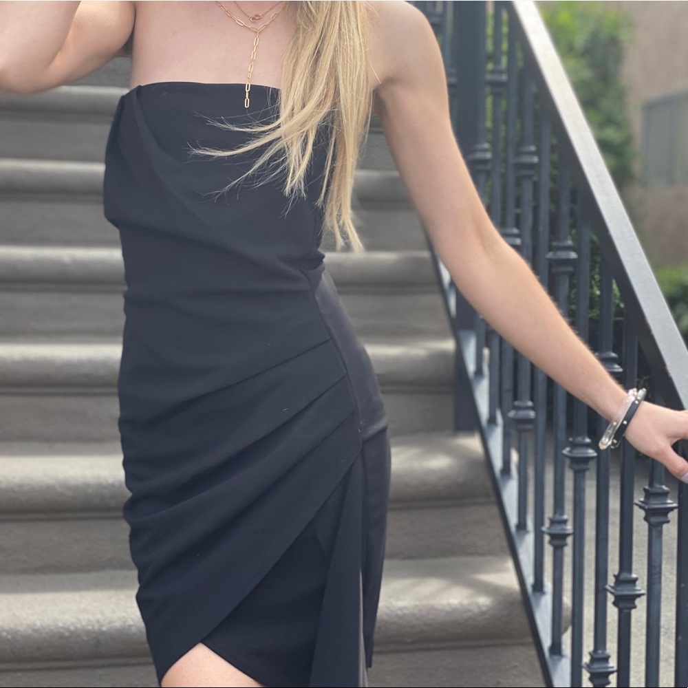 Strapless black pleaded dress